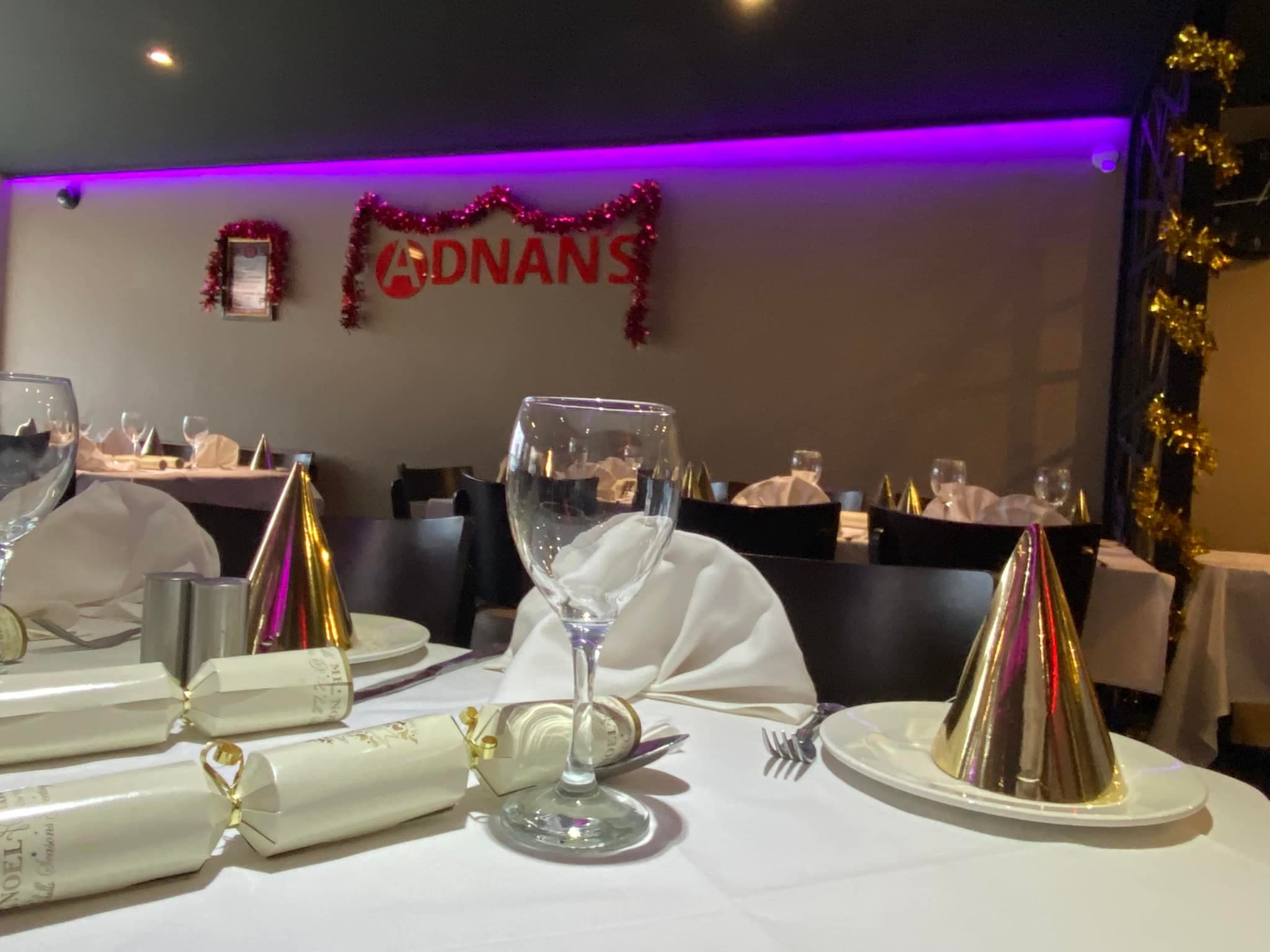 Dining tables set for service at ADNANS