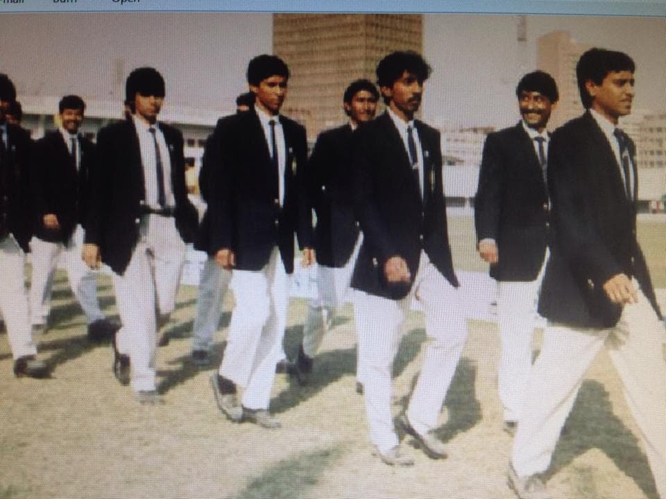 The team walking in official blazers